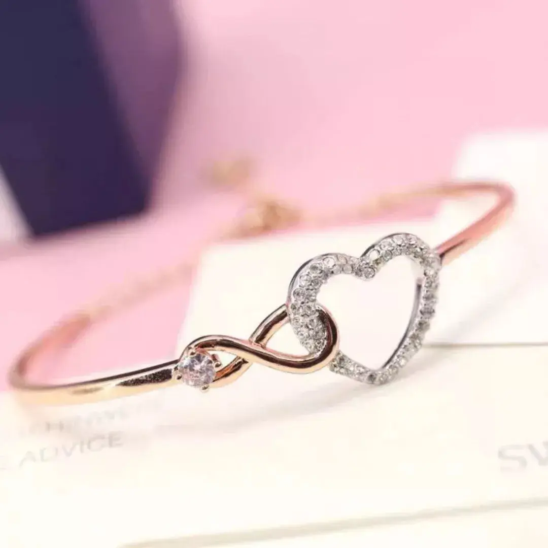 SET CONJUNTO COLLAR Y PULSERA CORAZON INFINITO SWAROVSKI ORO ROSA - Image 3